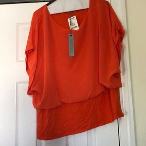 Orange batwing blouse